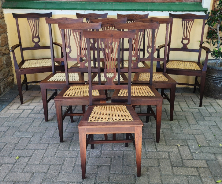 HANDSOME SET OF 10 STINKWOOD DINING CHAIRS WITH CANE SEATS, PRICE: R24500.00 SET
